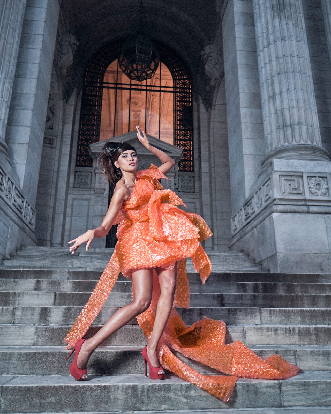 The orange gown in motion on the steps
